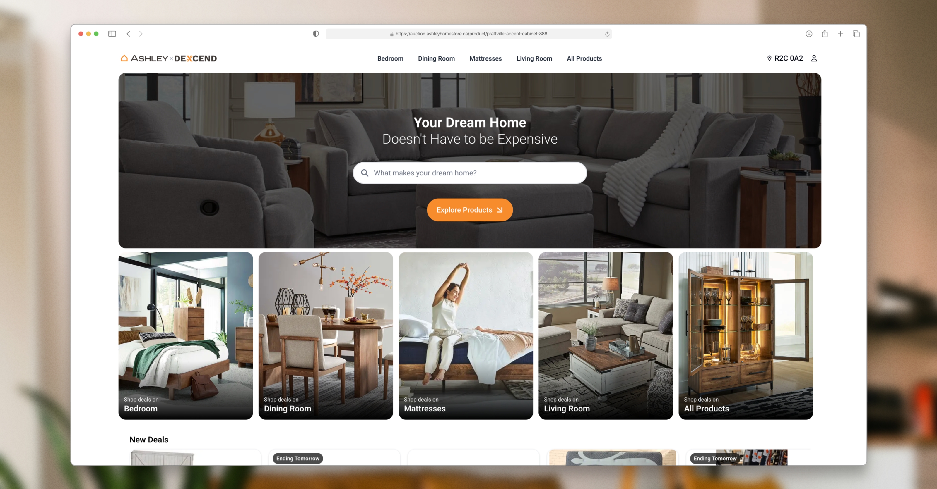 After: redesigned Ashley x Descend homepage with a spacious auction landing page layout.